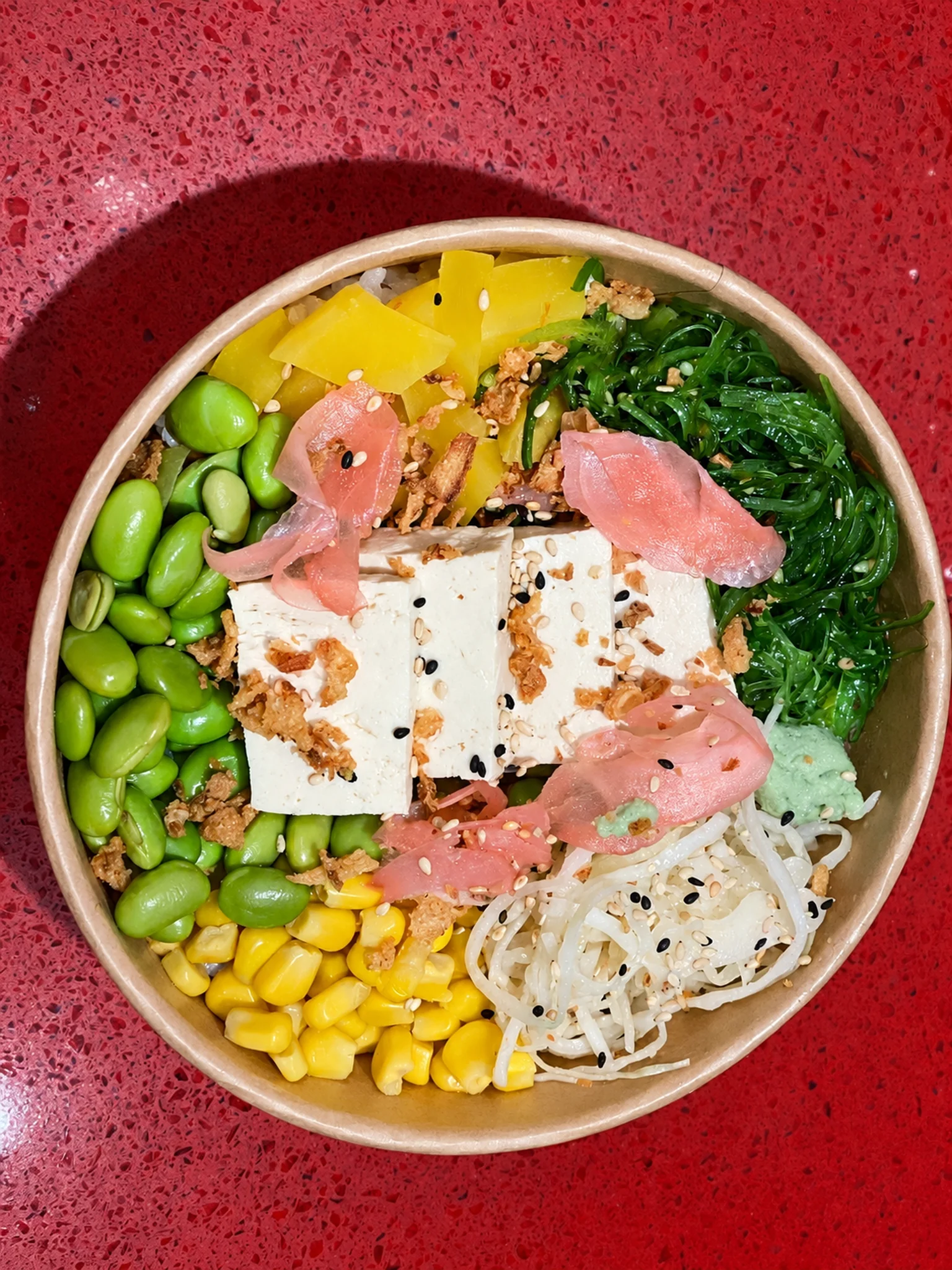 Dish in a bowl on a red table