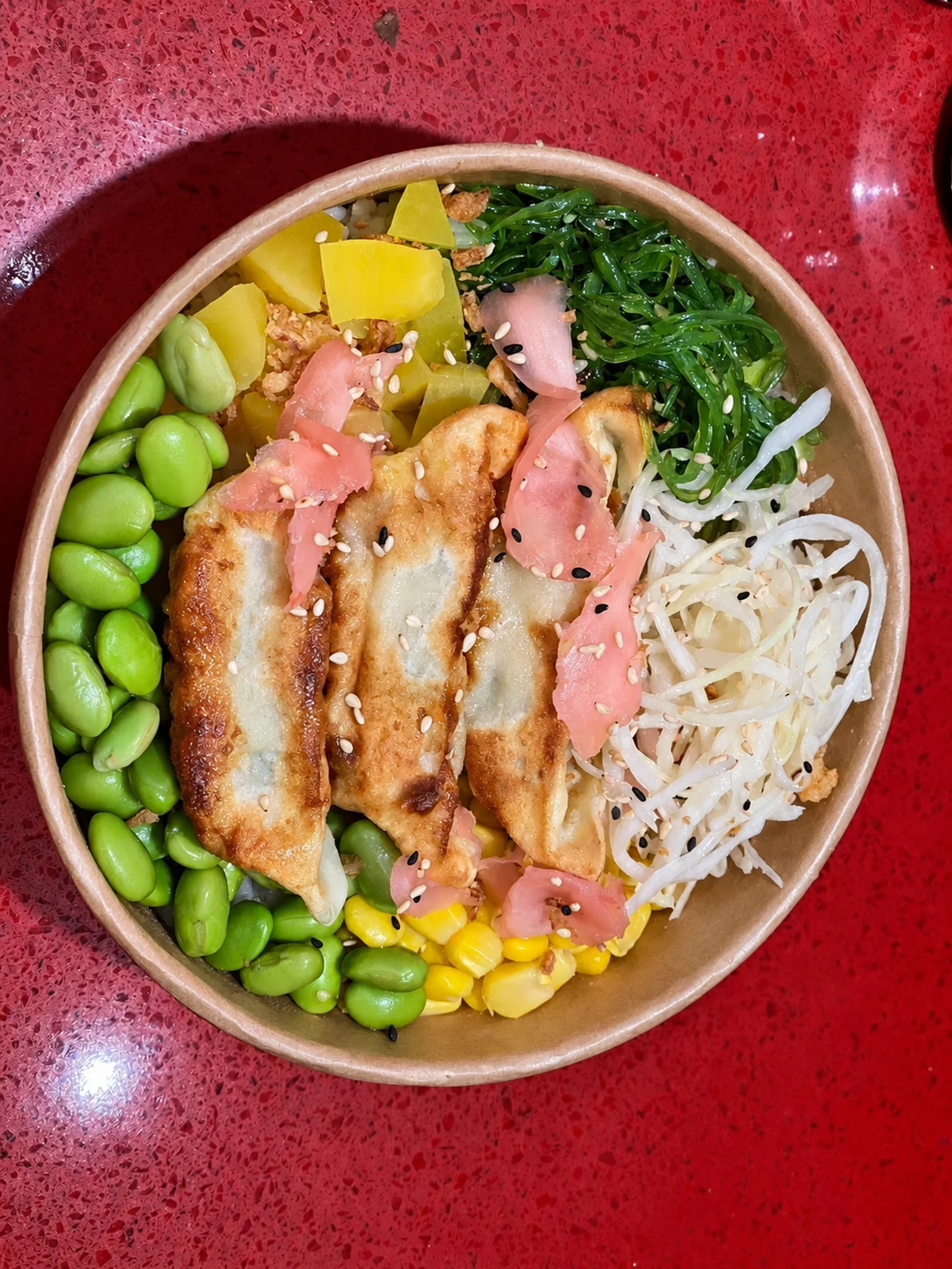 Dish in a bowl on a red table